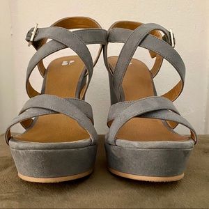 Grey wedge styled high heels